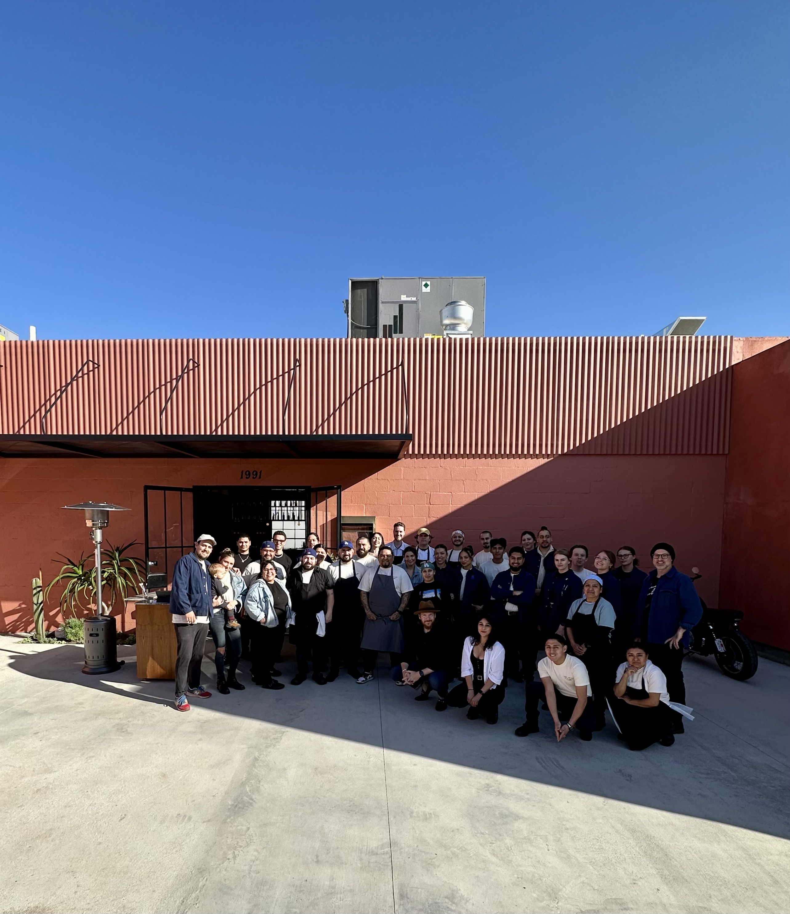 The full Loreto team gathered outside the restaurant