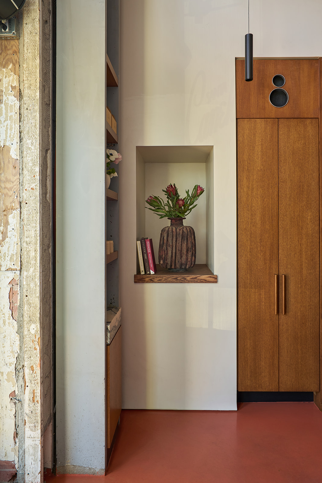 Plaster niche with protea flowers